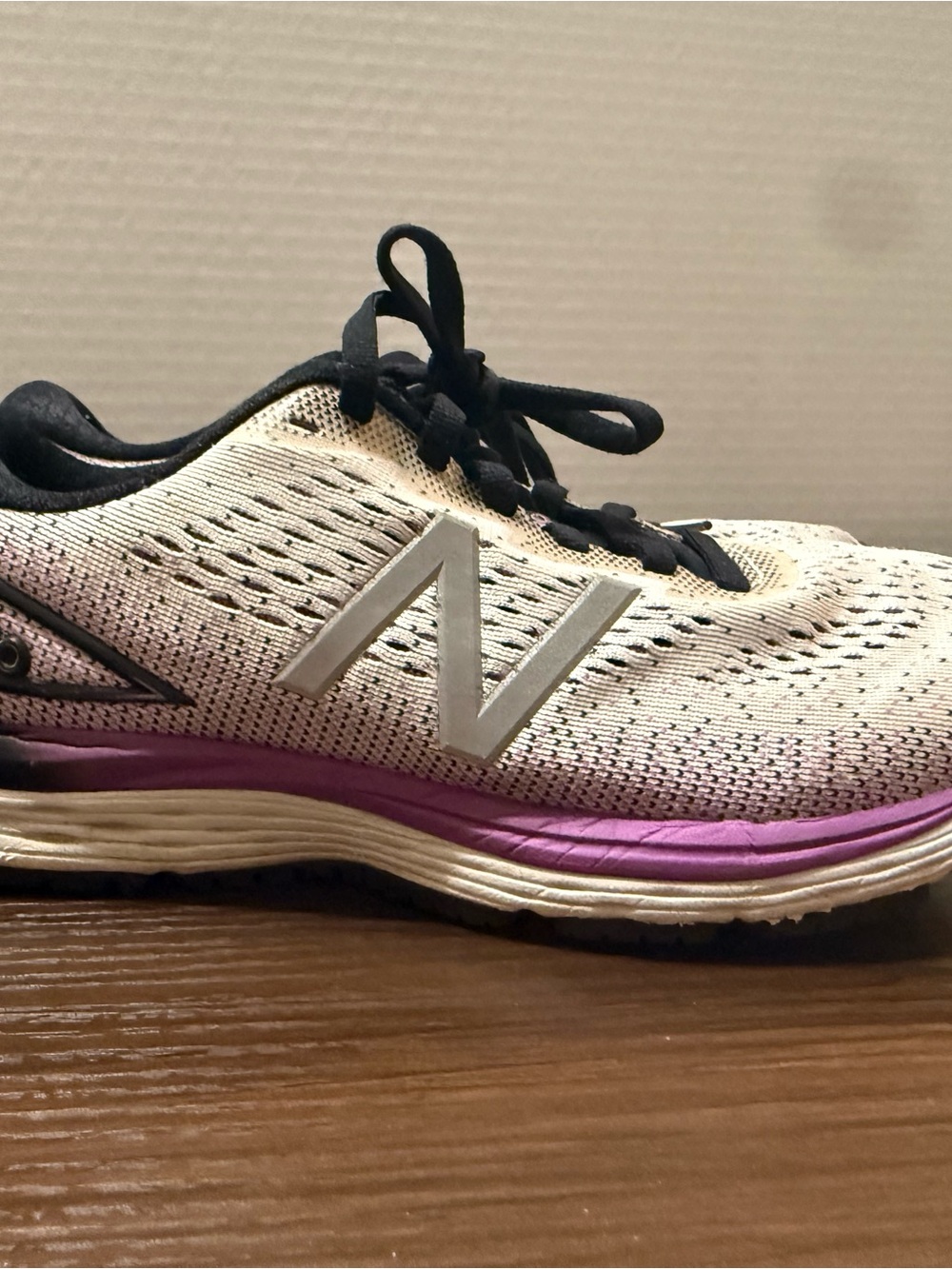New Balance Women's Cream and Black Running Shoes with Purple Detail